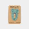 Clip forrado con lazo crochet turquesa