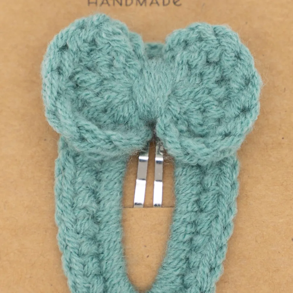 Clip forrado con lazo crochet turquesa