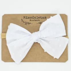 Diadema bebé lazo blanca plumeti