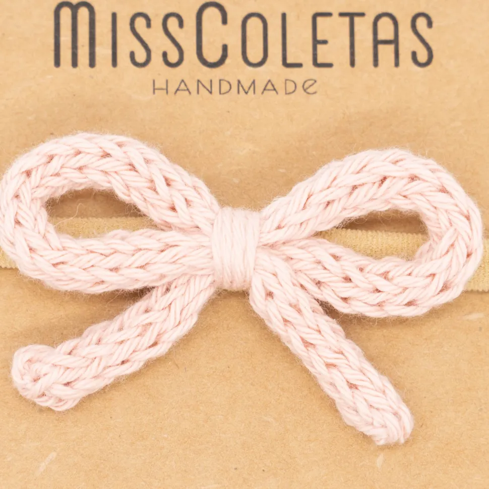 Diadema bebé lazo cordón crochet rosa