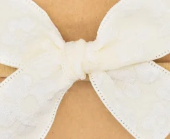 Diadema bebé lazo estampado satinado beige