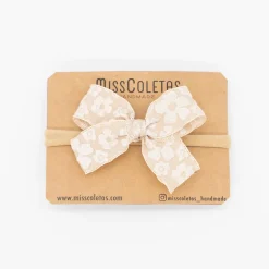 Diadema bebé lazo estampado satinado beige tostado