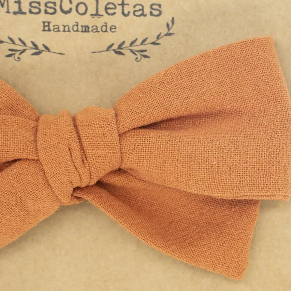 Diadema bebé lazo naranja rústico