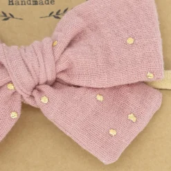 Diadema bebé lazo rosa topos oro