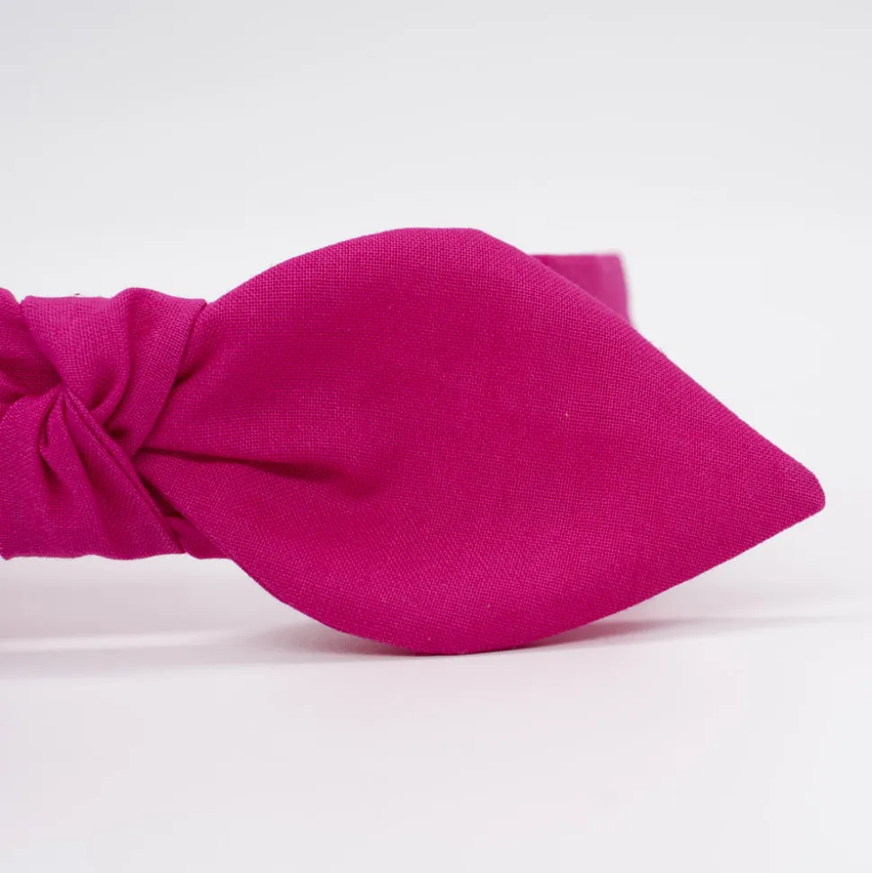 Diadema lazo chloé fucsia hecha a mano
