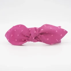 Diadema lazo chloé fucsia plumeti hecha a mano