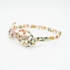 Diadema lazo flores Agatha hecha a mano