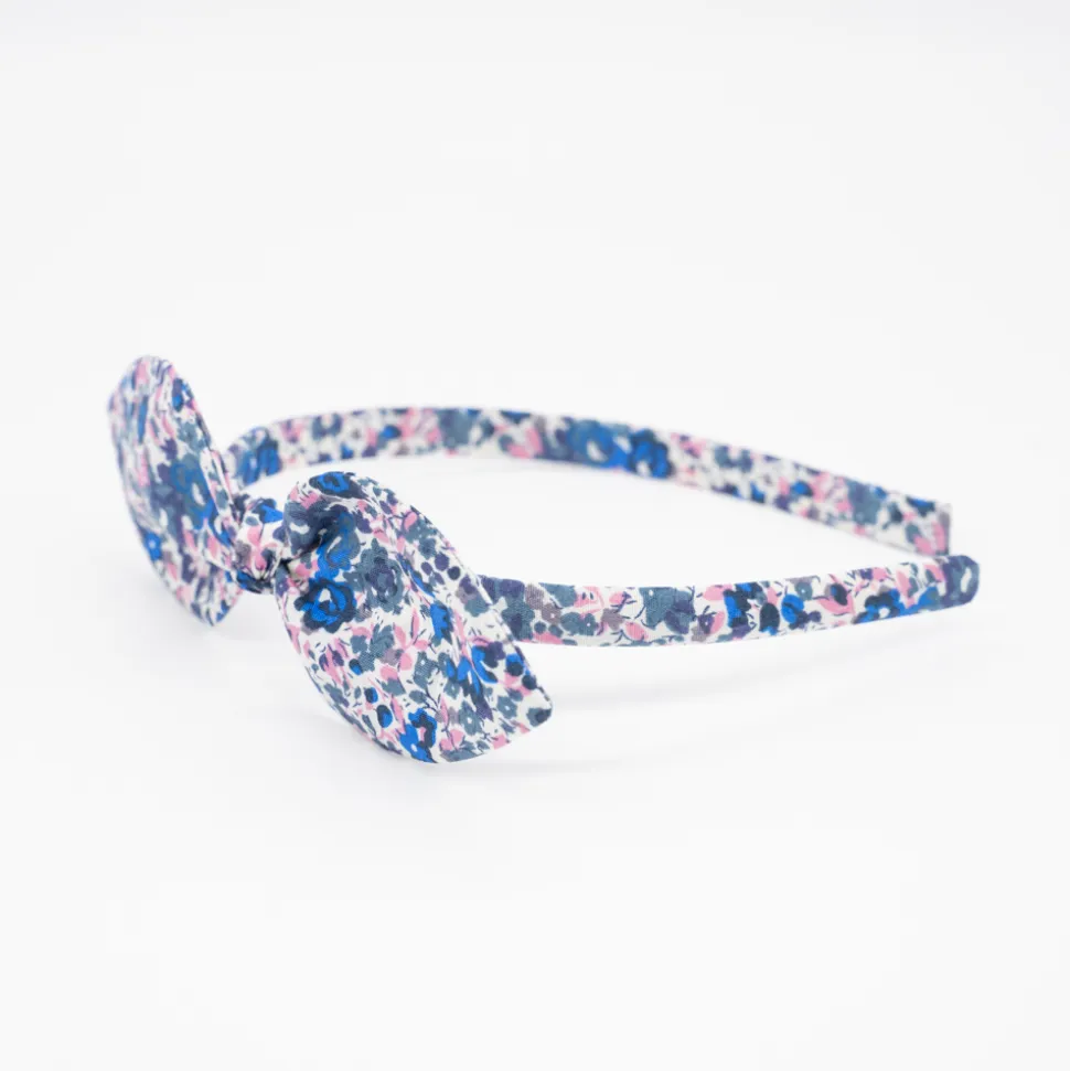 Diadema lazo flores azul marino hecha a mano