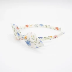 Diadema lazo flores pastel hecha a mano