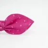 Diadema lazo fucsia plumeti hecha a mano