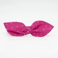 Diadema lazo fucsia plumeti hecha a mano