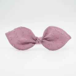 Diadema lazo malva rosa plumeti hecha a mano