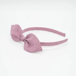 Diadema lazo malva rosa plumeti hecha a mano