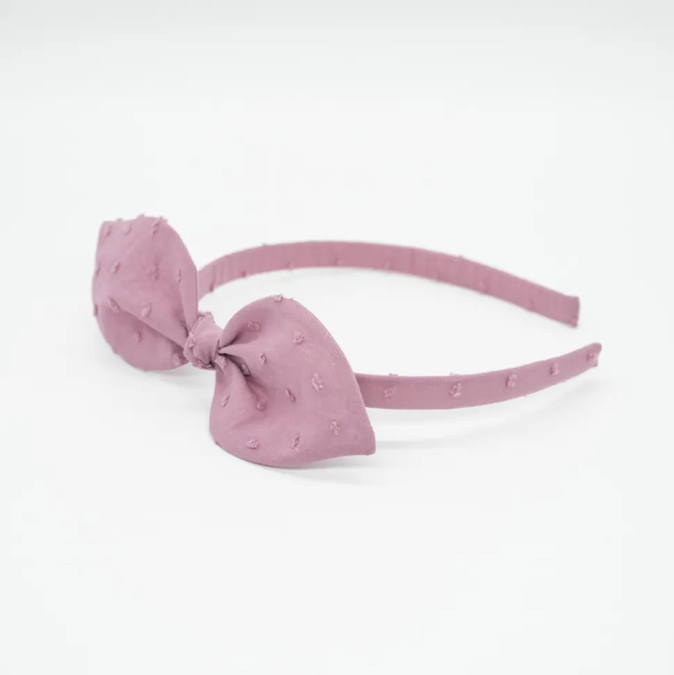 Diadema lazo malva rosa plumeti hecha a mano