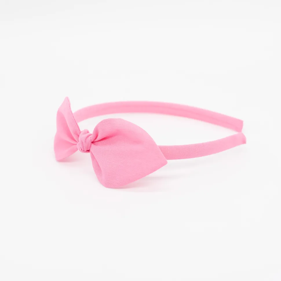 Diadema lazo rosa chicle hecha a mano