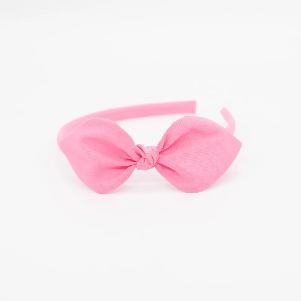 Diadema lazo rosa chicle hecha a mano