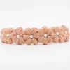 Diadema niña flores crochet perla rosa nude oscuro