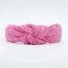 Diadema nudo bordada rosa fucsia hecha a mano