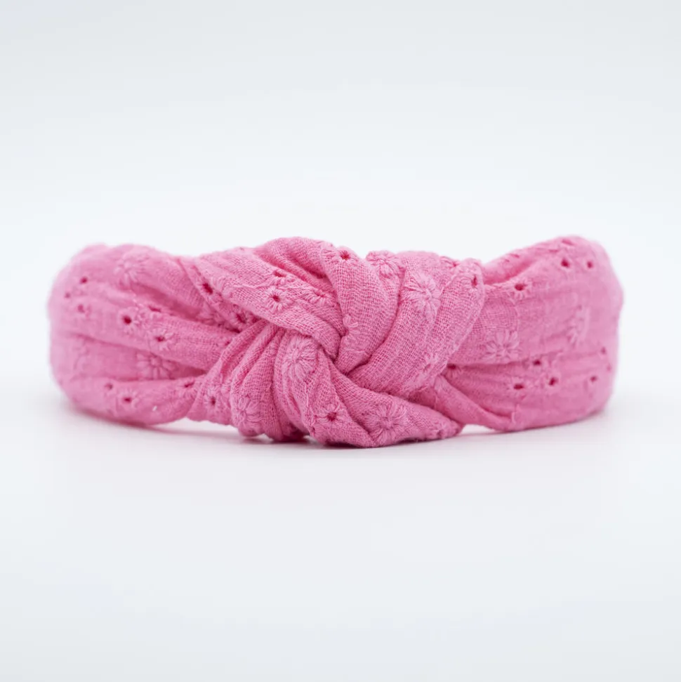 Diadema nudo bordada rosa fucsia hecha a mano
