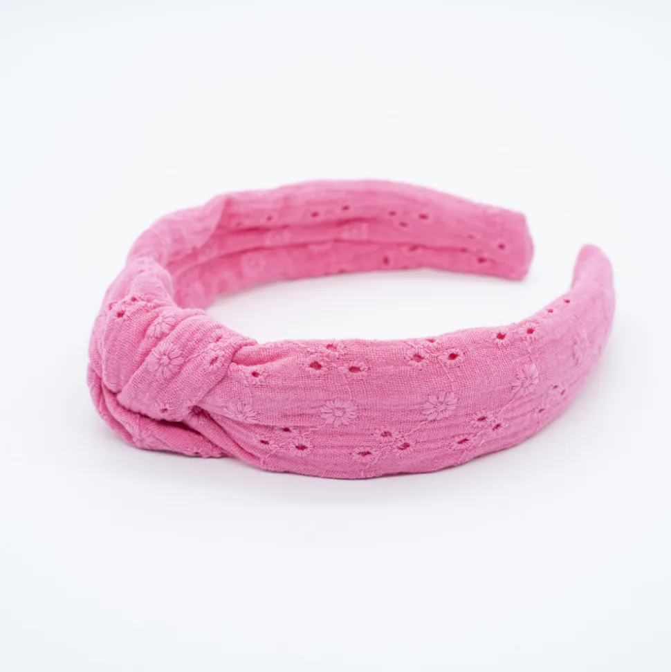 Diadema nudo bordada rosa fucsia hecha a mano
