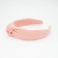 Diadema nudo coral plumeti hecha a mano