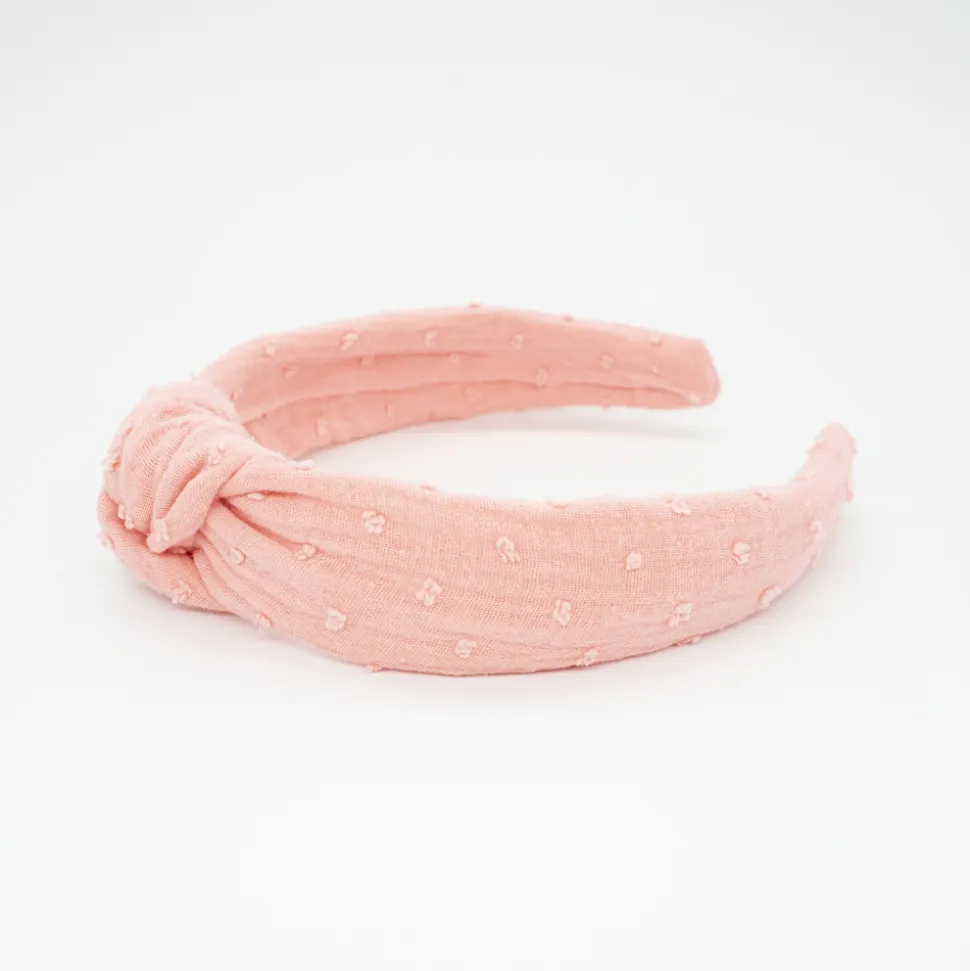 Diadema nudo coral plumeti hecha a mano