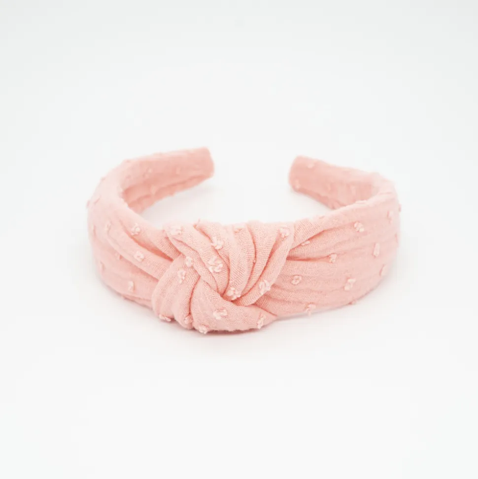 Diadema nudo coral plumeti hecha a mano