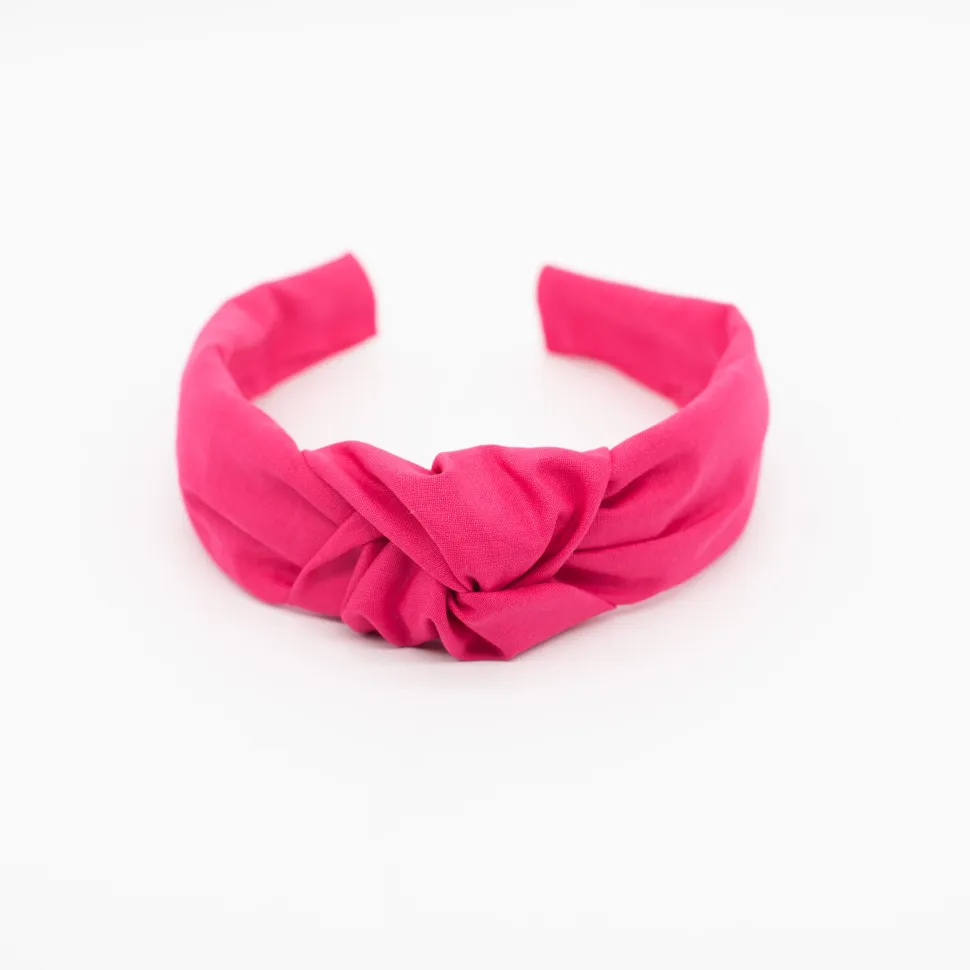 Diadema nudo fucsia hecha a mano