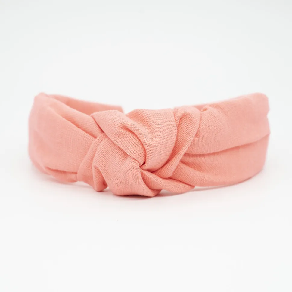 Diadema nudo light coral lino hecha a mano