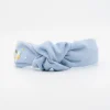 Diadema nudo lino azul celeste bordada a mano. PREMIUM