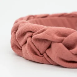 Diadema trenzada rosa