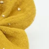 Pinza mariposa amarillo ocre topos dorados