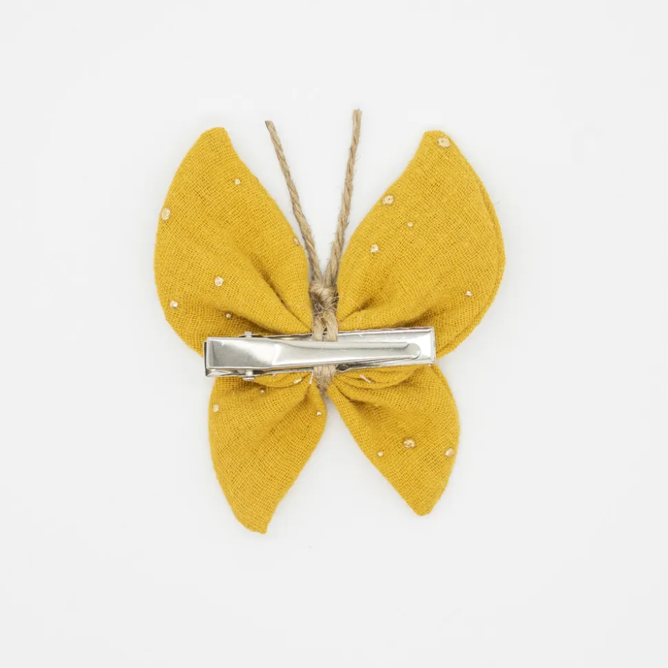 Pinza mariposa amarillo ocre topos dorados