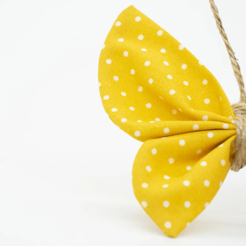 Pinza mariposa amarillo topos