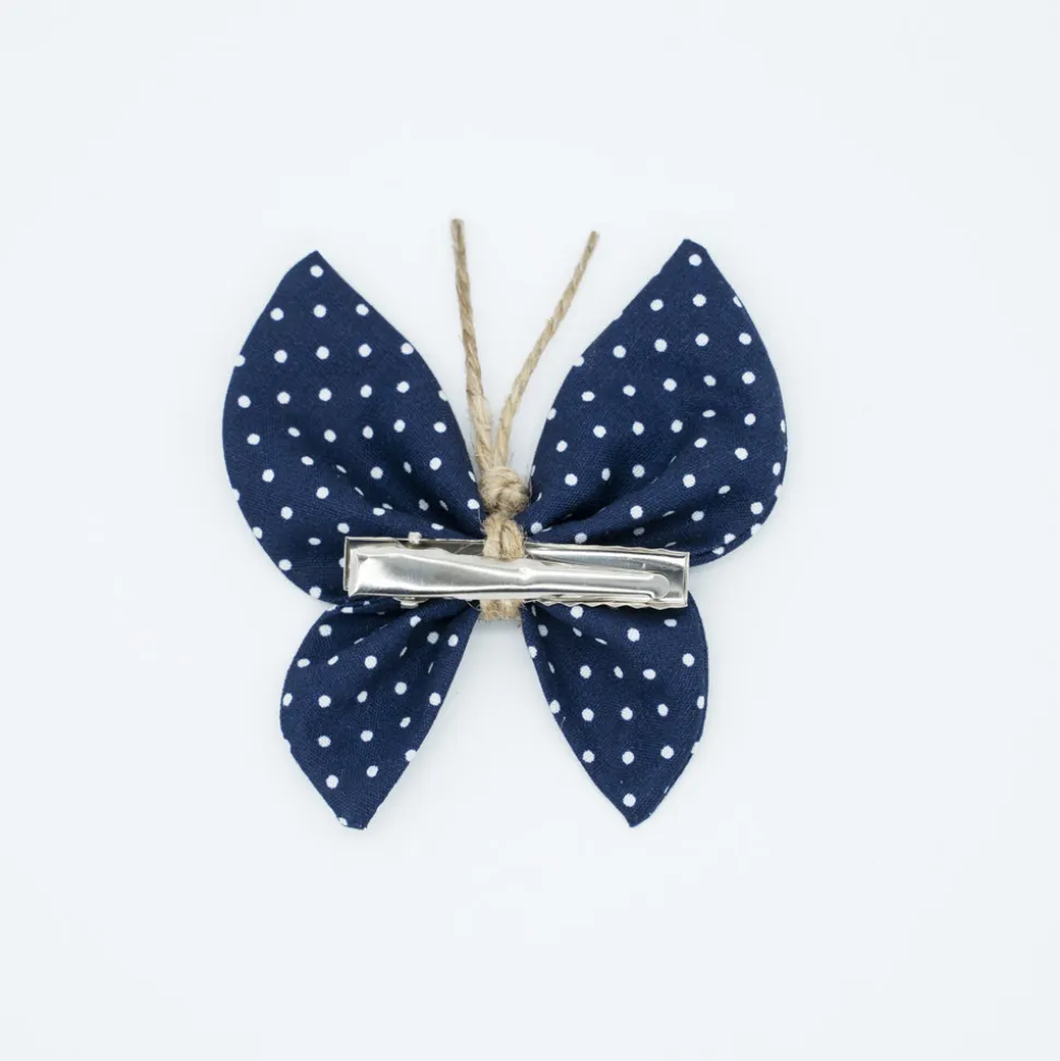 Pinza mariposa azul marino topos