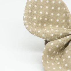 Pinza mariposa beige topos