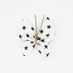 Pinza mariposa blanca estrellas