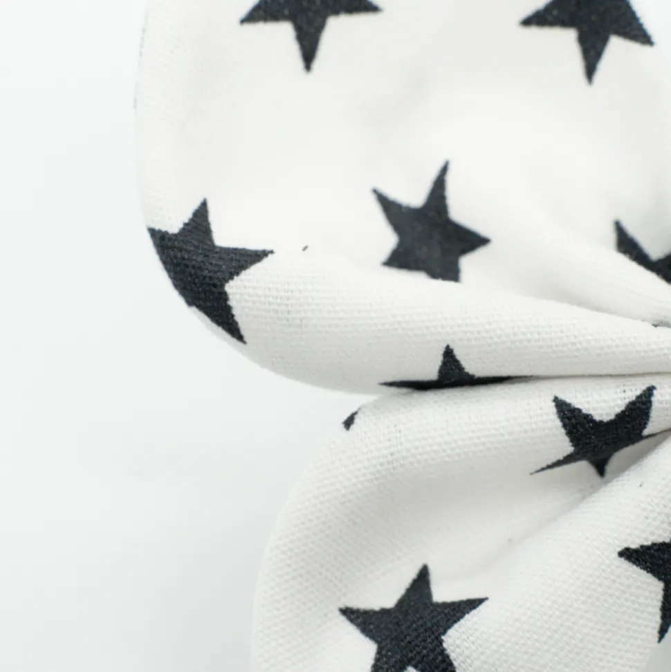 Pinza mariposa blanca estrellas