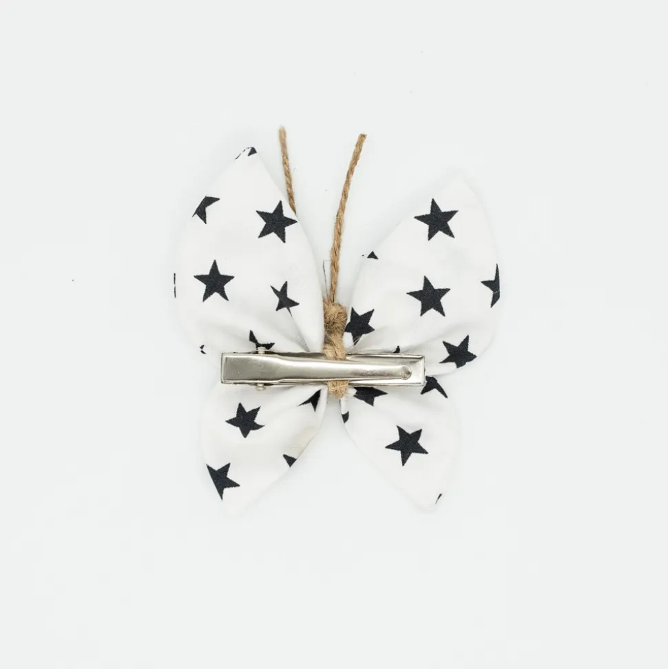 Pinza mariposa blanca estrellas