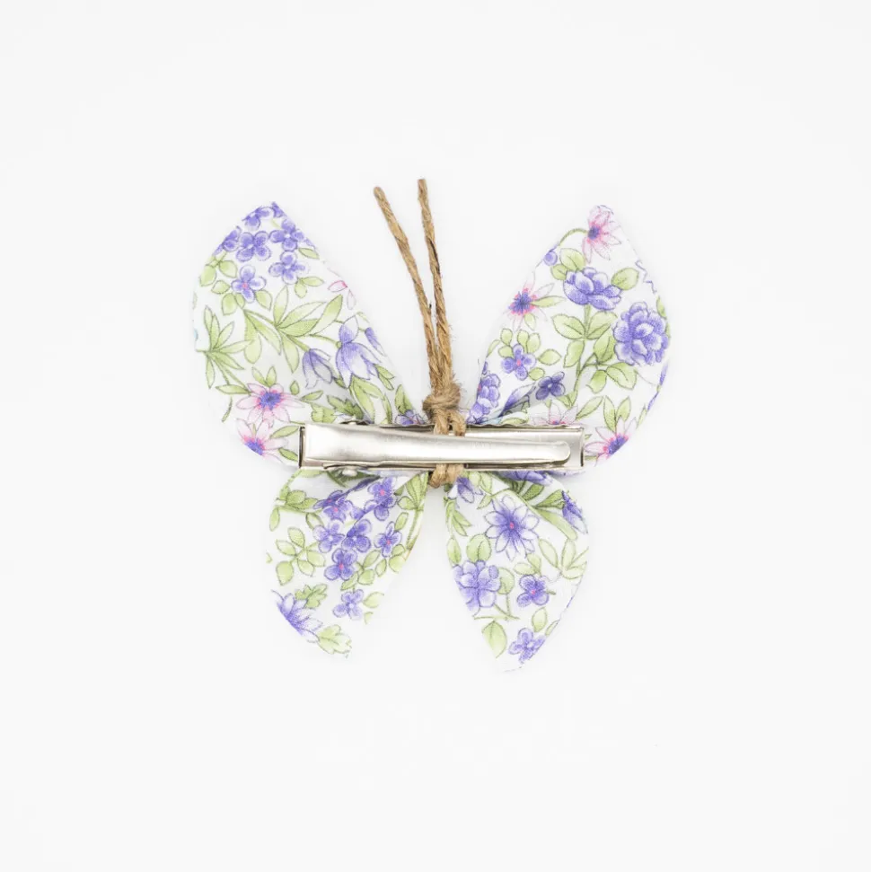 Pinza mariposa flores malva