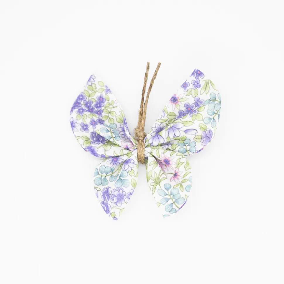 Pinza mariposa flores malva