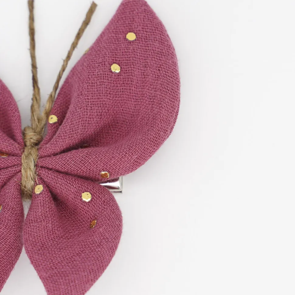 Pinza mariposa frambuesa topos oro
