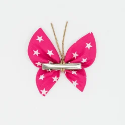 Pinza mariposa fucsia estrellas