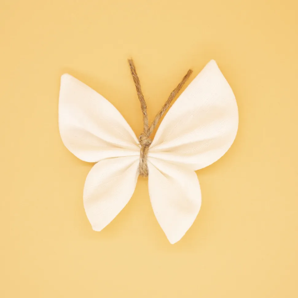 Pinza mariposa lino marfil