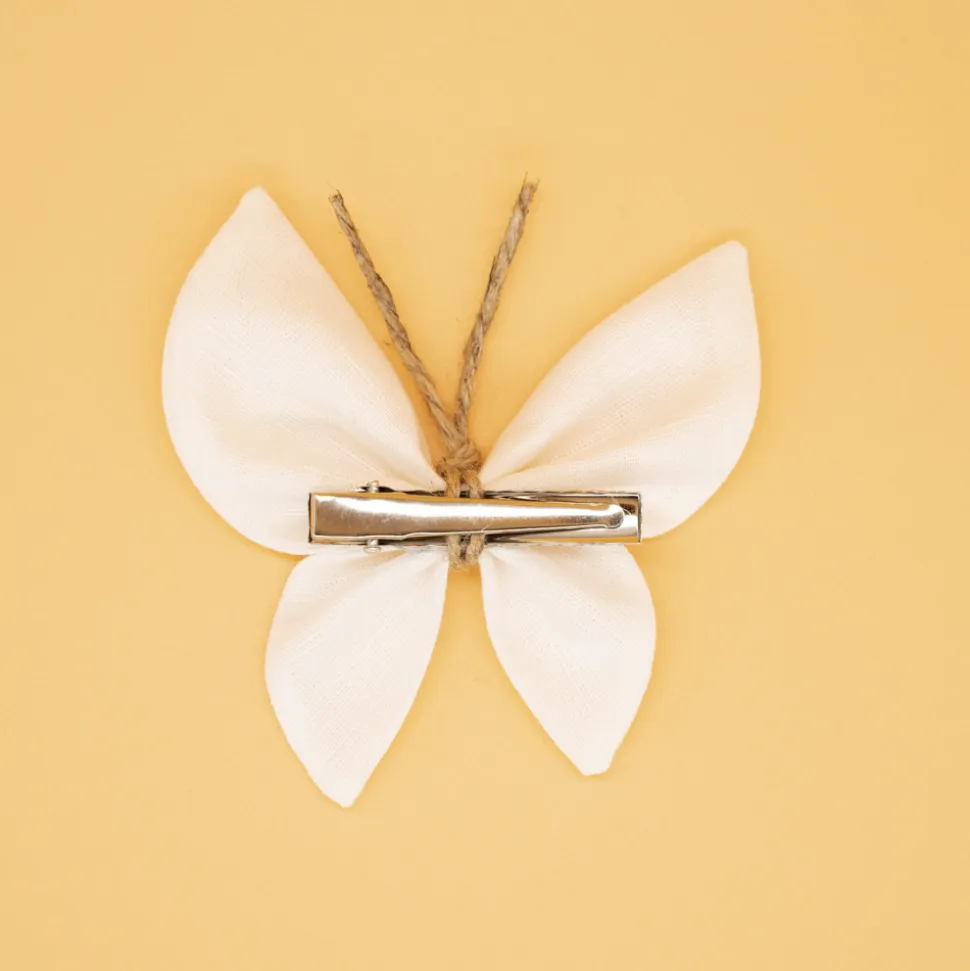 Pinza mariposa lino marfil