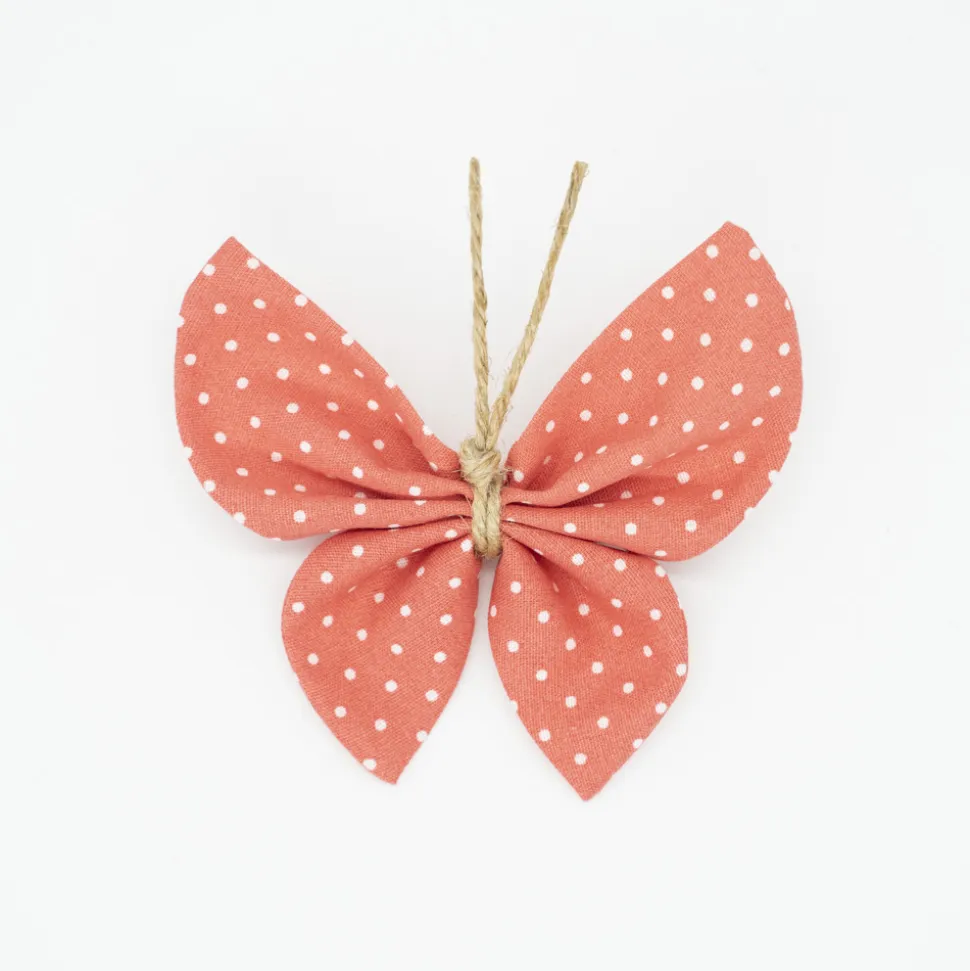 Pinza mariposa naranja coral topos