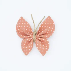 Pinza mariposa rosa topos