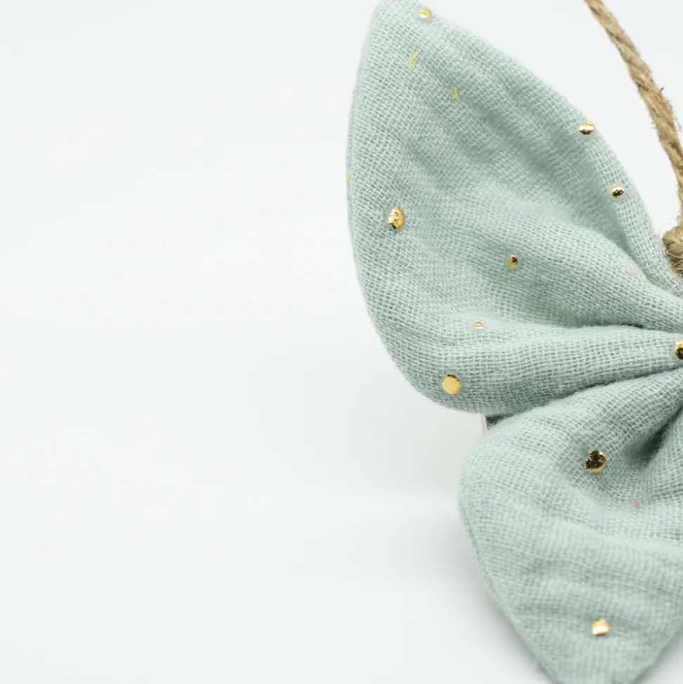 Pinza mariposa verde mint topos oro